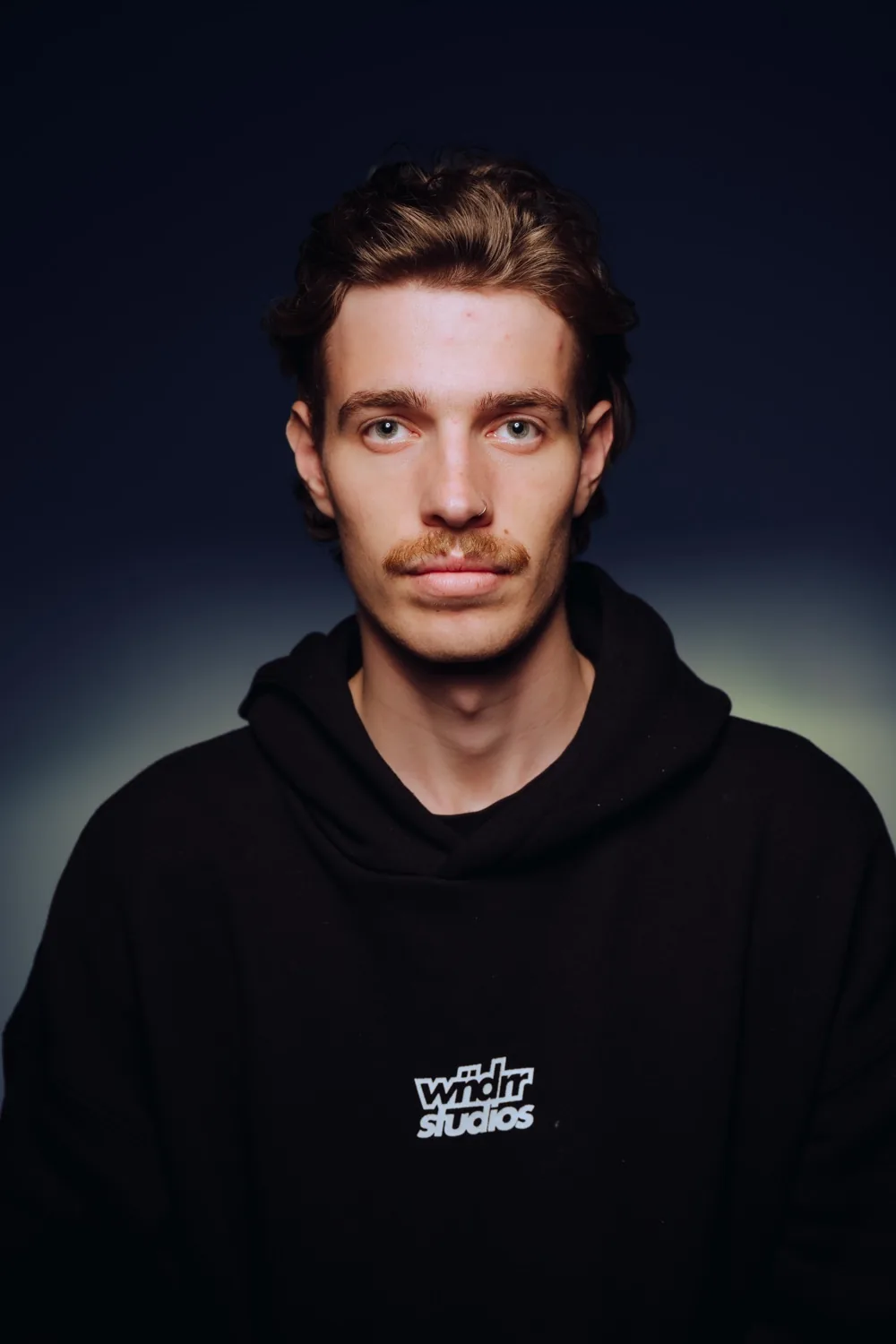 Professional headshot taken at The M1 Group studio