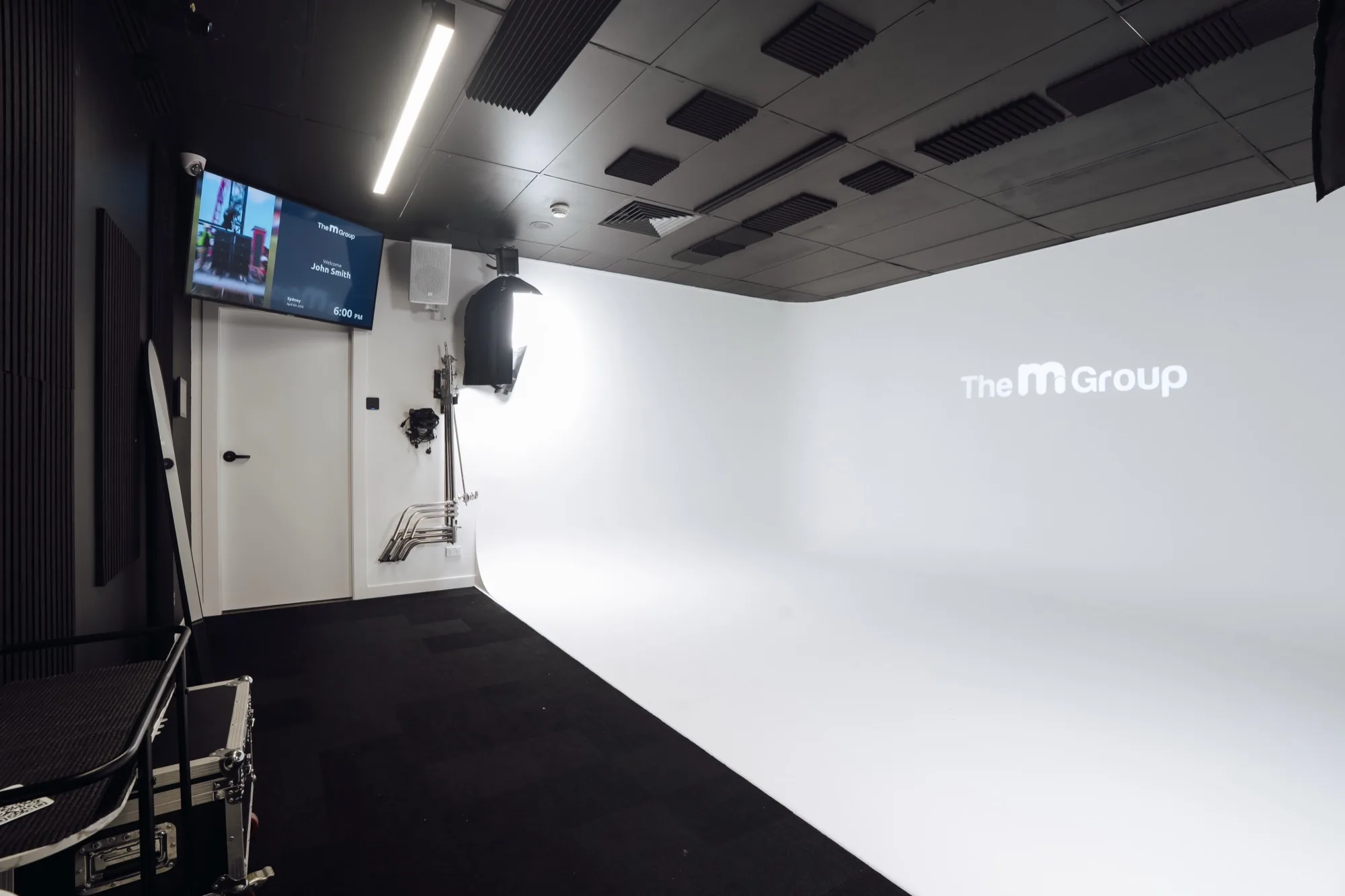 The M1 Group branding on the cyclorama